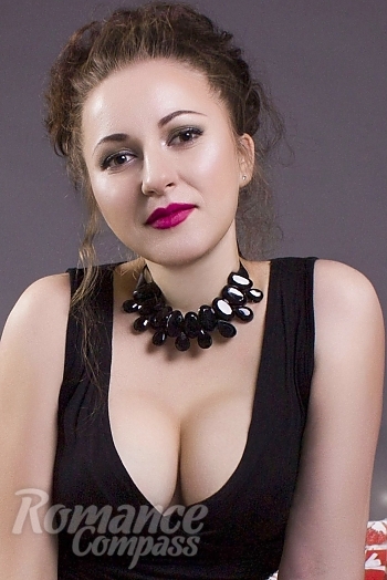 Ukrainian mail order bride Ksenyia from Kakhovka with light brown hair and brown eye color - image 1