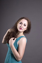 Ukrainian mail order bride Ksenyia from Kakhovka with light brown hair and brown eye color - image 4