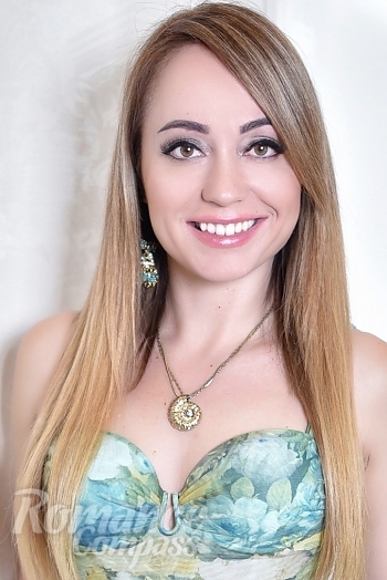 Ukrainian mail order bride Olga from Odessa with light brown hair and brown eye color - image 1
