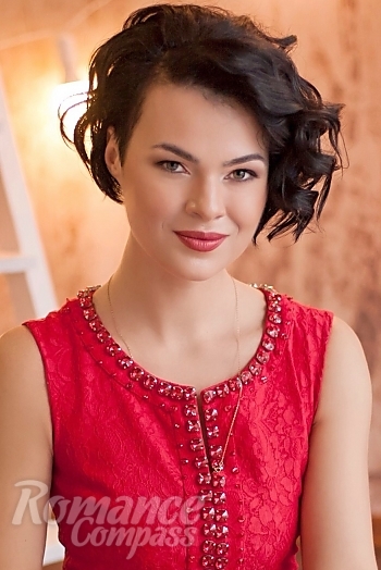 Ukrainian mail order bride Ekaterina from Berdyansk with black hair and green eye color - image 1