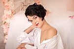 Ukrainian mail order bride Ekaterina from Berdyansk with black hair and green eye color - image 9