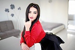 Ukrainian mail order bride Valeria from Lugansk with black hair and green eye color - image 3