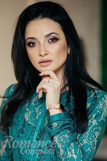 Ukrainian mail order bride Victoria from Kiev with black hair and brown eye color - image 1