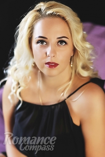 Ukrainian mail order bride Viktoria from Rivne with blonde hair and hazel eye color - image 1