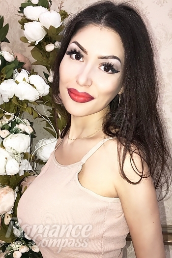 Ukrainian mail order bride Lilia from Kharkov with black hair and brown eye color - image 1