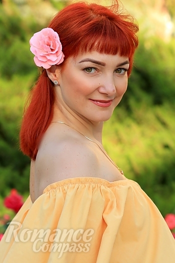 Ukrainian mail order bride Irina from Nikolaev with red hair and green eye color - image 1