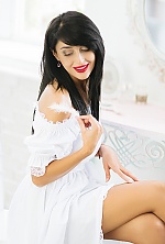 Ukrainian mail order bride Oksana from Odessa with black hair and brown eye color - image 17
