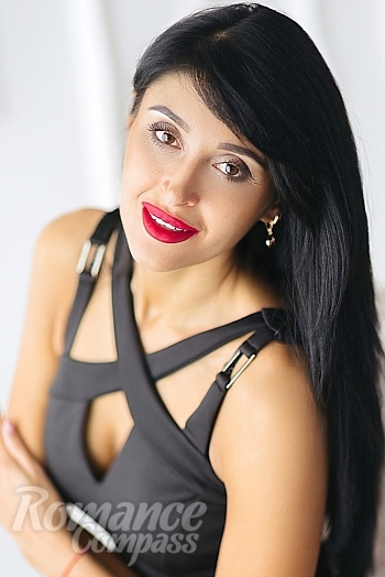 Ukrainian mail order bride Oksana from Odessa with black hair and brown eye color - image 1