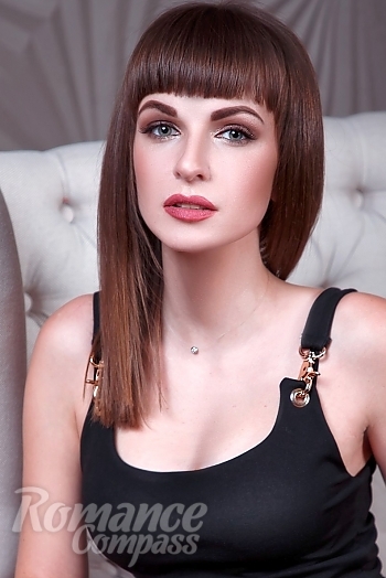 Ukrainian mail order bride Anastasia from Kharkov with brunette hair and green eye color - image 1