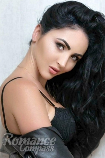 Ukrainian mail order bride Viktoriia from Kharkov with black hair and green eye color - image 1