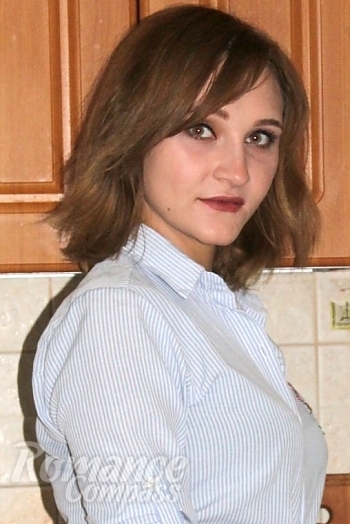 Ukrainian mail order bride Anna from Poltava with light brown hair and green eye color - image 1