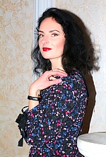 Ukrainian mail order bride Ilona from Sumy with black hair and green eye color - image 3