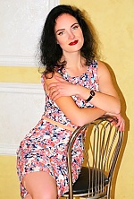 Ukrainian mail order bride Ilona from Sumy with black hair and green eye color - image 2