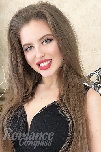 Ukrainian mail order bride Melisa from Kharkov with light brown hair and blue eye color - image 1