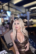 Ukrainian mail order bride Viktoriia from Kiev with blonde hair and green eye color - image 10