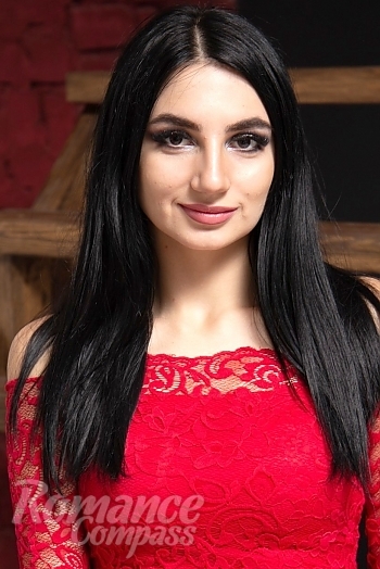 Ukrainian mail order bride Victoria from Rostov with black hair and brown eye color - image 1