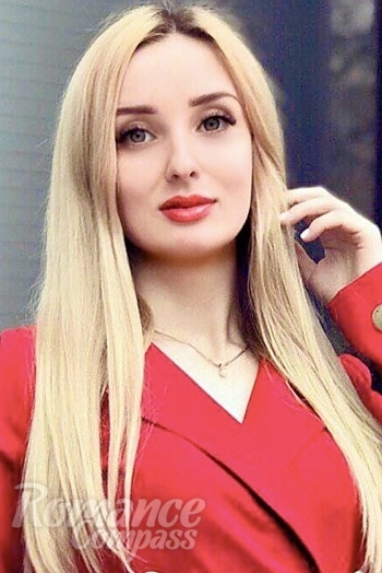 Ukrainian mail order bride Alina from Kiev with blonde hair and blue eye color - image 1
