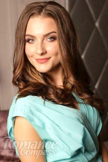 Ukrainian mail order bride Sasha from Kiev with light brown hair and blue eye color - image 1