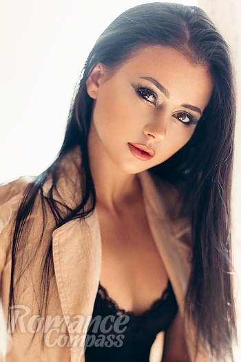 Ukrainian mail order bride Karina from Nikopol with light brown hair and brown eye color - image 1
