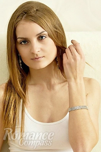 Ukrainian mail order bride Alena from Minsk with light brown hair and green eye color - image 1