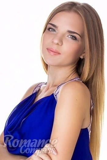 Ukrainian mail order bride Ksenia from Kharkiv with light brown hair and brown eye color - image 1