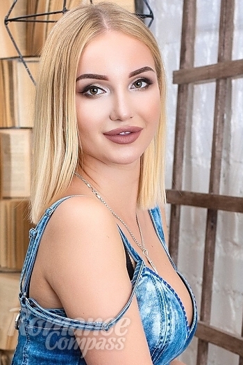 Ukrainian mail order bride Julia from Odessa with blonde hair and green eye color - image 1