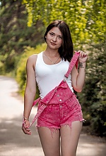 Ukrainian mail order bride Alexandra from Kyev with black hair and green eye color - image 2