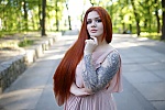 Ukrainian mail order bride Olha from Kiev with red hair and brown eye color - image 11