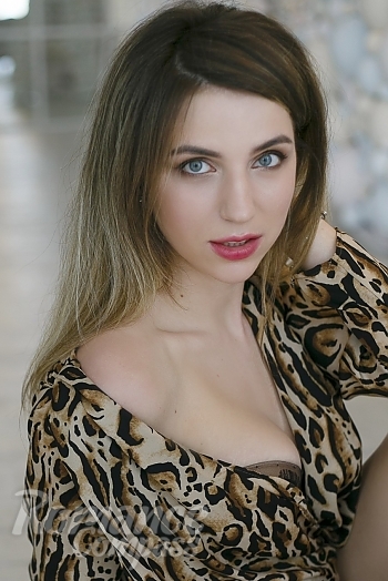 Ukrainian mail order bride Elena from Kiev with light brown hair and blue eye color - image 1