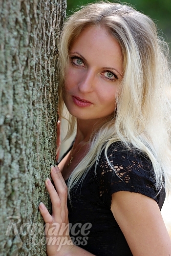 Ukrainian mail order bride Maria from Kyev with blonde hair and green eye color - image 1