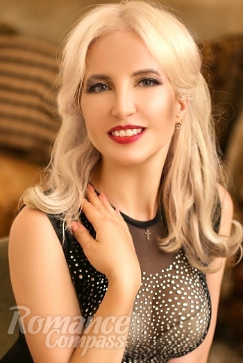 Ukrainian mail order bride Victoria from Kharkov with blonde hair and green eye color - image 1