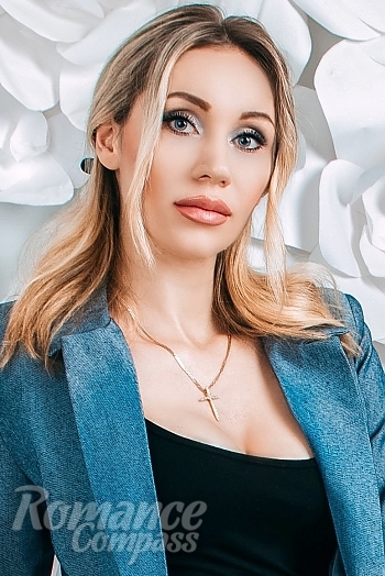 Ukrainian mail order bride Maria from Kiev with blonde hair and green eye color - image 1