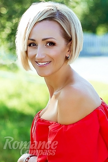 Ukrainian mail order bride Olga from Kiev with blonde hair and hazel eye color - image 1