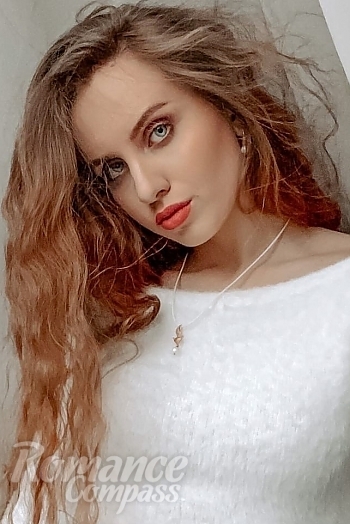 Ukrainian mail order bride Natasha from Kyiv with light brown hair and blue eye color - image 1