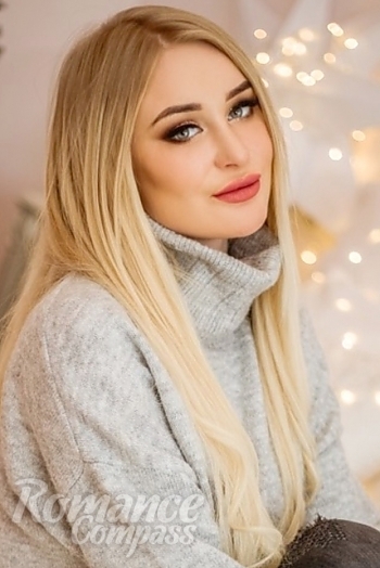 Ukrainian mail order bride Vika from Kiev with blonde hair and blue eye color - image 1