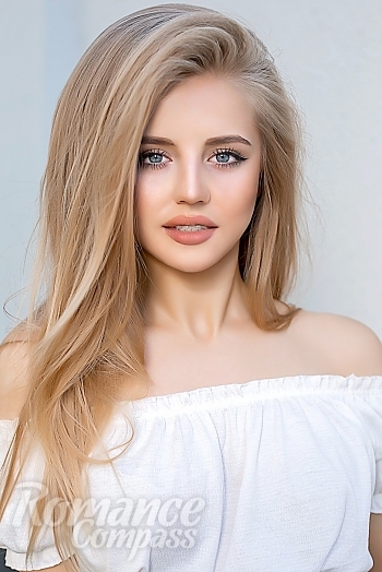 Ukrainian mail order bride Loredana from Bucharest with blonde hair and brown eye color - image 1