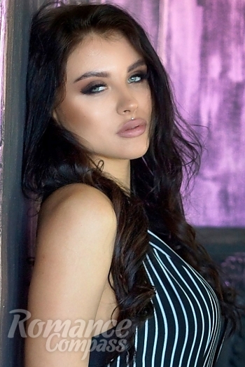 Ukrainian mail order bride Ruslana from Odessa with brunette hair and green eye color - image 1
