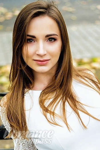 Ukrainian mail order bride Nataliya from Nikolaev with light brown hair and green eye color - image 1