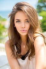 Ukrainian mail order bride Vladislava from Bucharest with light brown hair and blue eye color - image 12