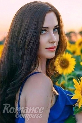 Ukrainian mail order bride Julia from Snovsk with light brown hair and blue eye color - image 1