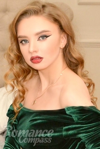 Ukrainian mail order bride Anastasia from Sumy with blonde hair and blue eye color - image 1