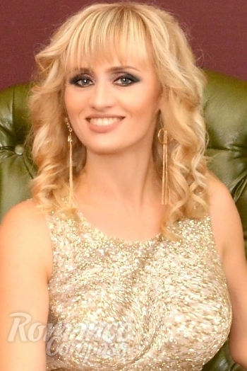 Ukrainian mail order bride Larisa from Sumy with blonde hair and blue eye color - image 1