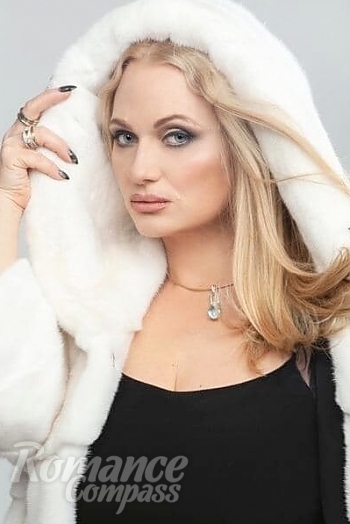 Ukrainian mail order bride Olesya from Kiev with blonde hair and grey eye color - image 1
