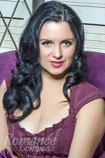 Ukrainian mail order bride Nelly from Kiev with black hair and brown eye color - image 1