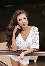 Ukrainian mail order bride Anastasia from Ivano-Frankovsk with brunette hair and hazel eye color - image 7