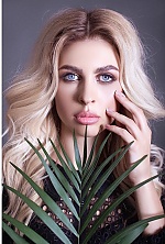 Ukrainian mail order bride Oksana from Kiev with blonde hair and blue eye color - image 8