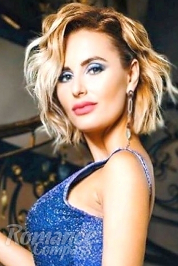 Ukrainian mail order bride Anna from Brest with blonde hair and brown eye color - image 1