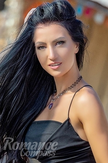 Ukrainian mail order bride Nastasiya from Kiev with black hair and green eye color - image 1
