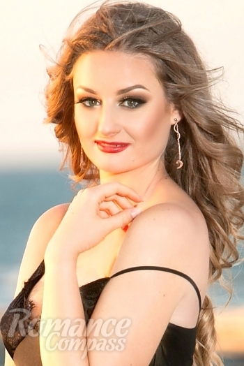 Ukrainian mail order bride Tatiana from Sevastopol with light brown hair and green eye color - image 1