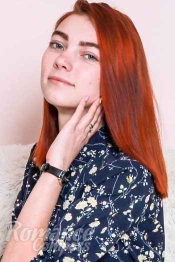 Ukrainian mail order bride Daria from Kiev with auburn hair and blue eye color - image 1